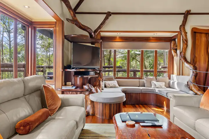 Open-plan living area inside The Nest treehouse